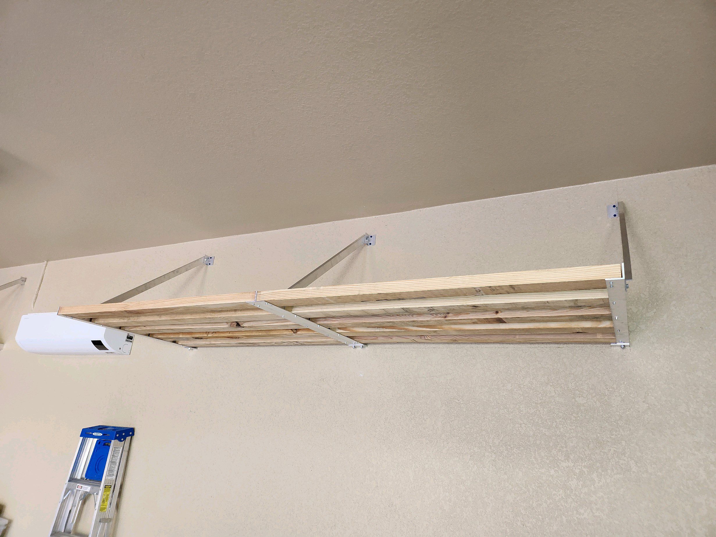 Garage shelving install by TE Reliable Handyman